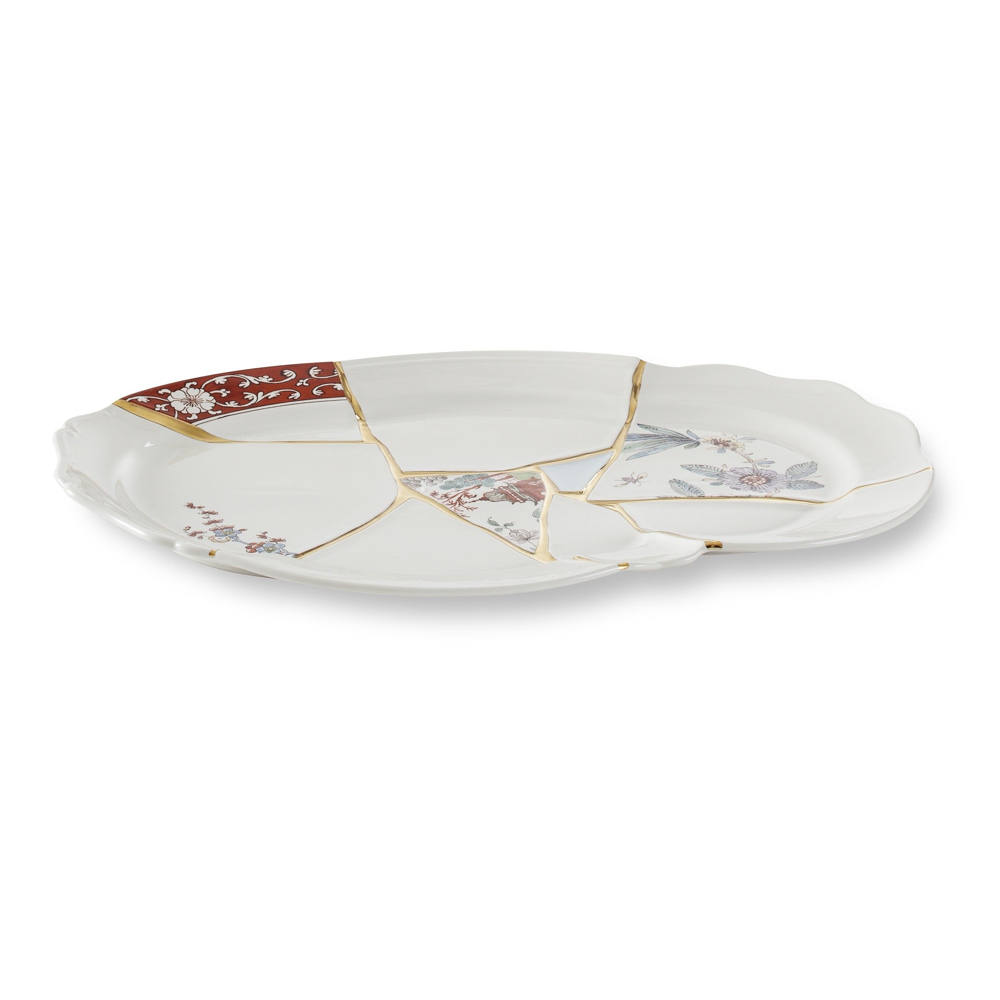Weißer Porzellanteller mit feinen Bruchlinien in Gold, ideal für Desserts oder auch als Frühstücksteller.