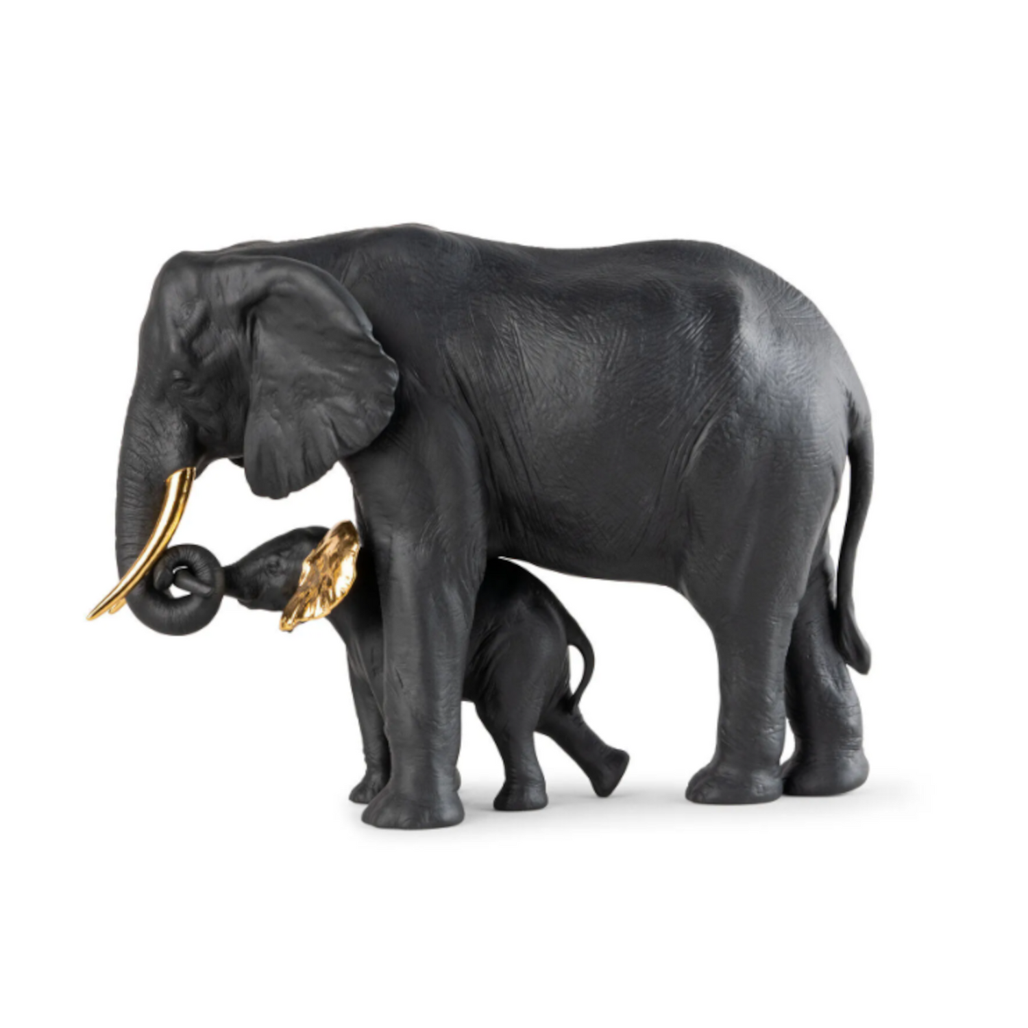 Elegante Elefantenskulptur aus mattschwarzem Porzellan mit goldenen Akzenten.