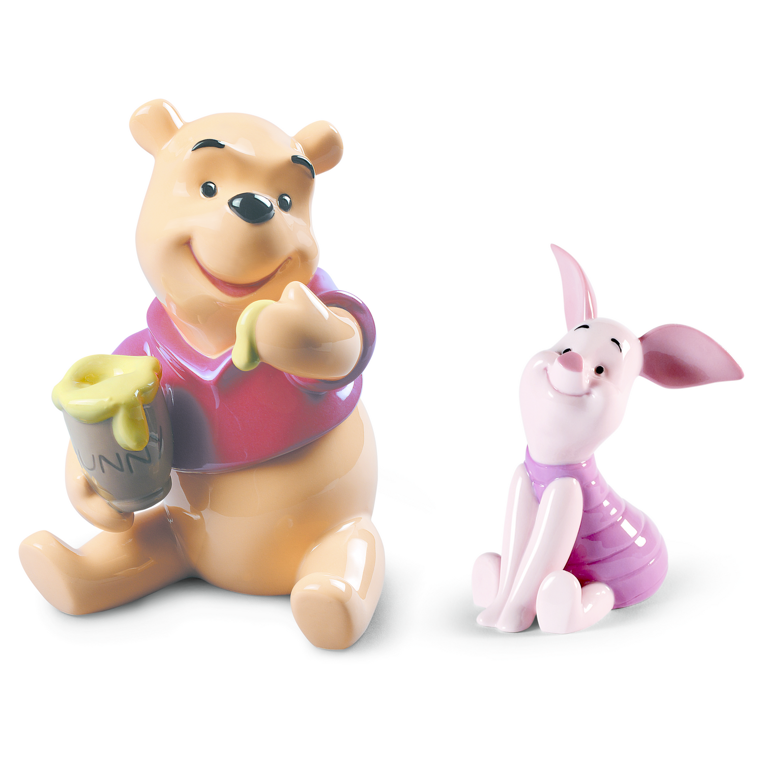 Hochwertiges Porzellanfiguren-Set von Winnie the Pooh und Piglet mit glänzender Oberfläche.