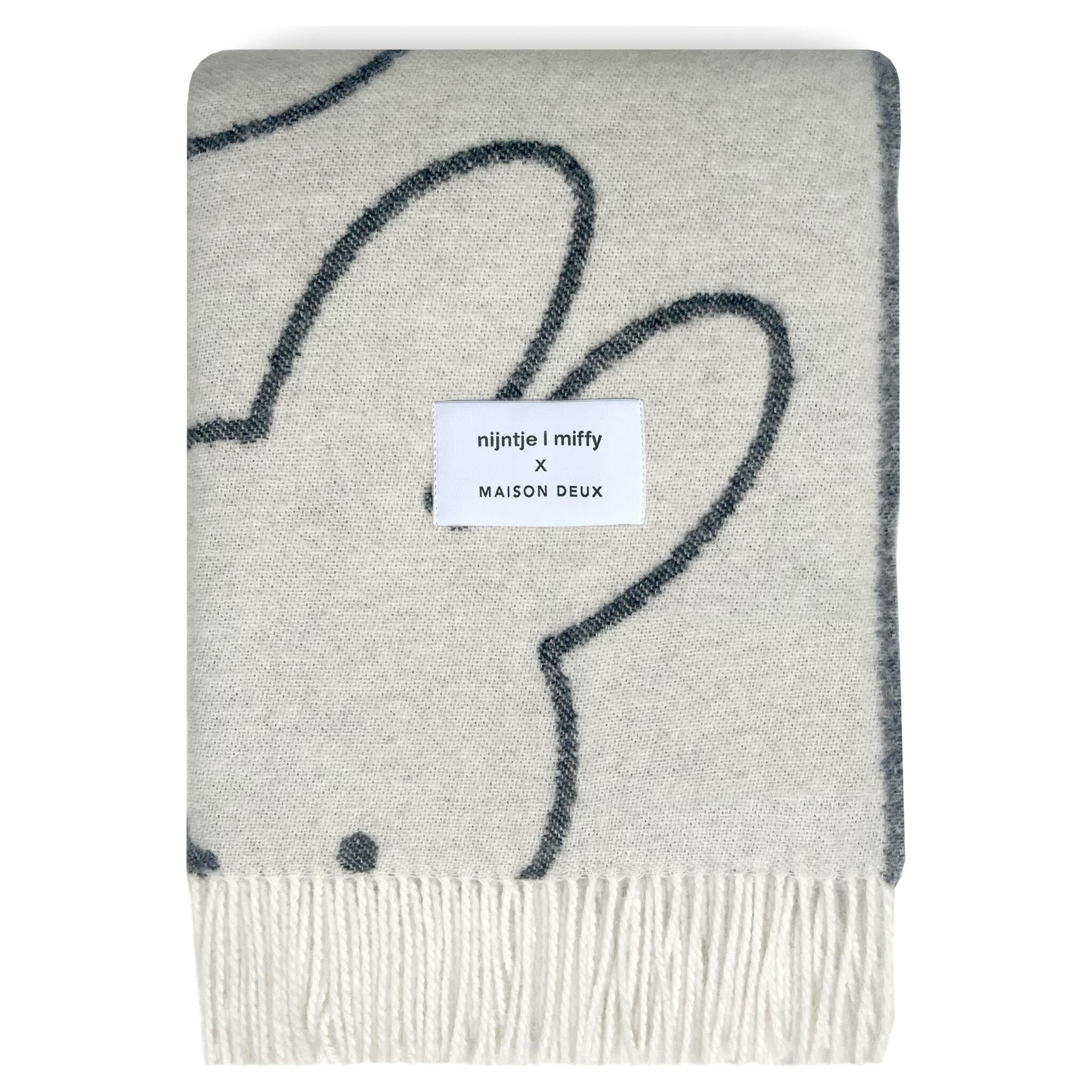 Jacquardgewebte Miffy Decke in Weiß und Schwarz aus reiner Wolle