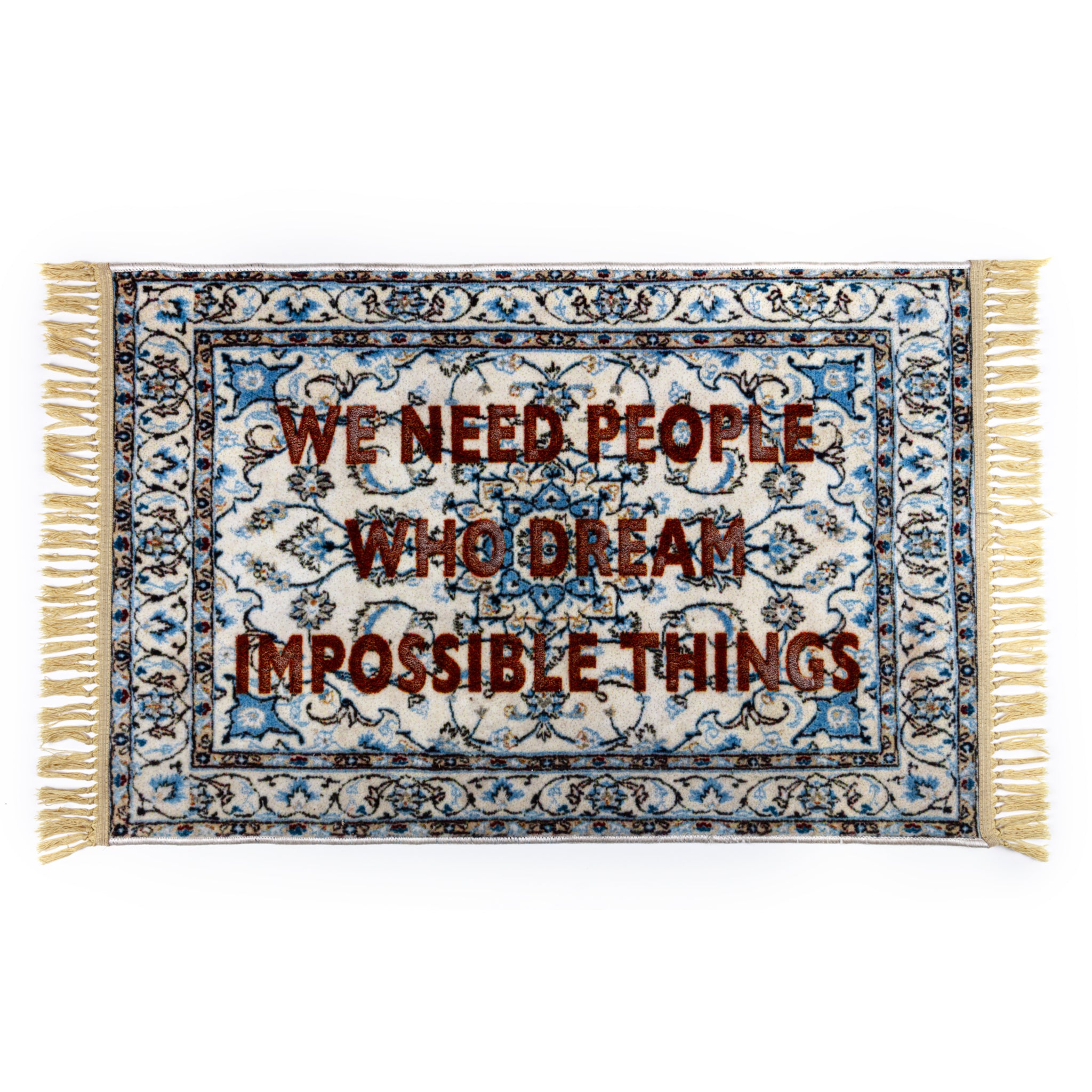 Designerteppich von Seletti mit inspirierendem Schriftzug in Blau und Beige