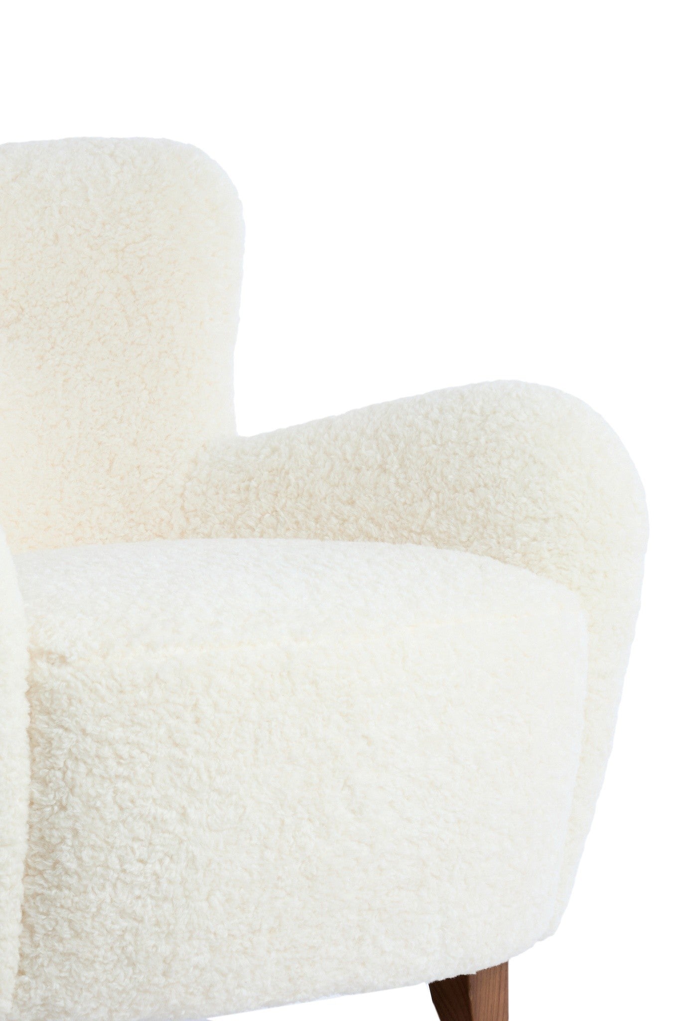 VREYA Sessel mit abgerundeten Armlehnen und kuscheliger Textur