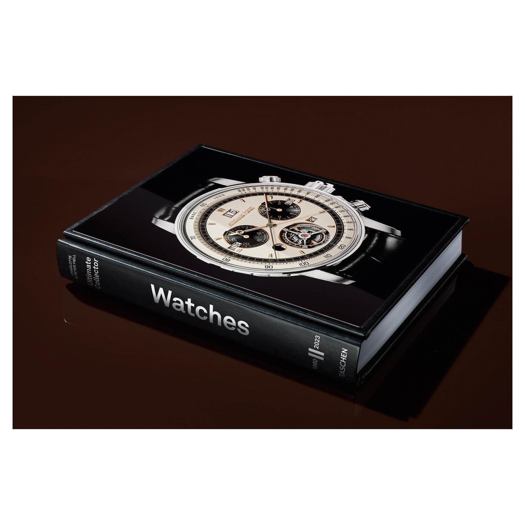 Buchset auf dunkler Holzfläche stilvoll präsentiert