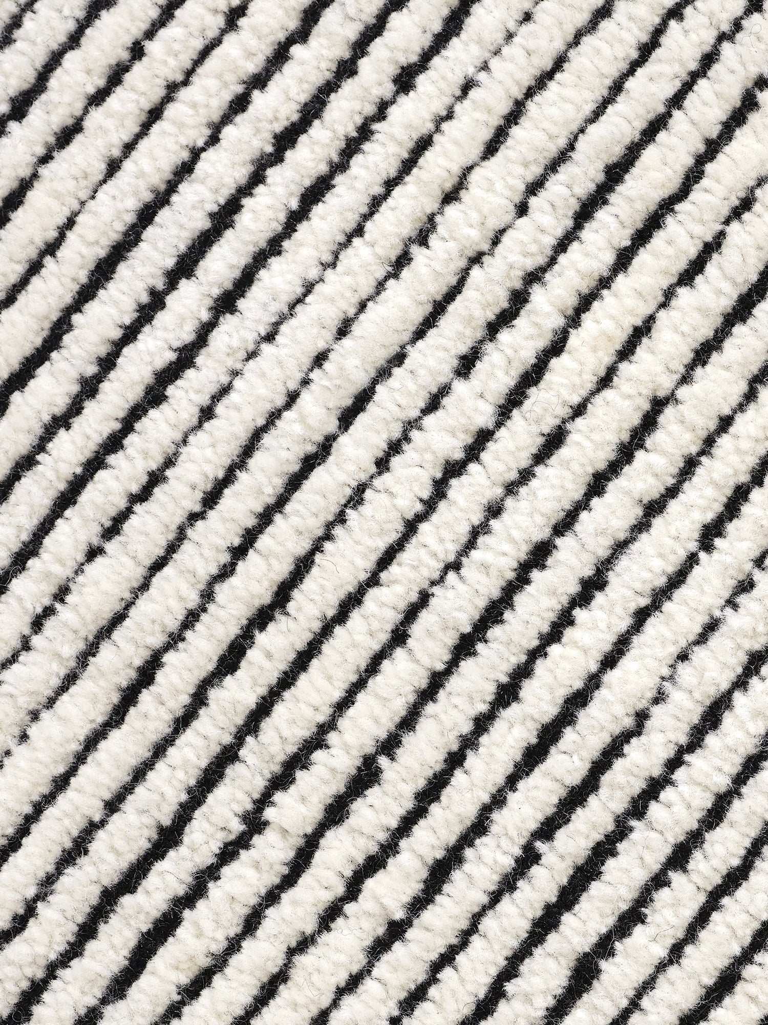 Disc Rug Black White Design markanter Teppich mit kontrastreichem Farbdesign aus Wolle und Baumwolle