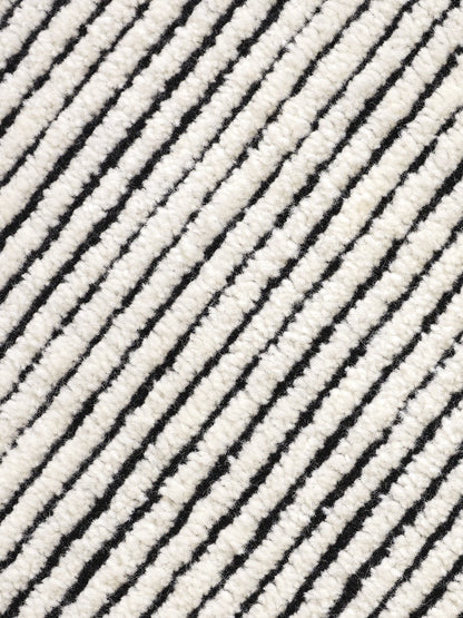 Disc Rug Black White Design markanter Teppich mit kontrastreichem Farbdesign aus Wolle und Baumwolle