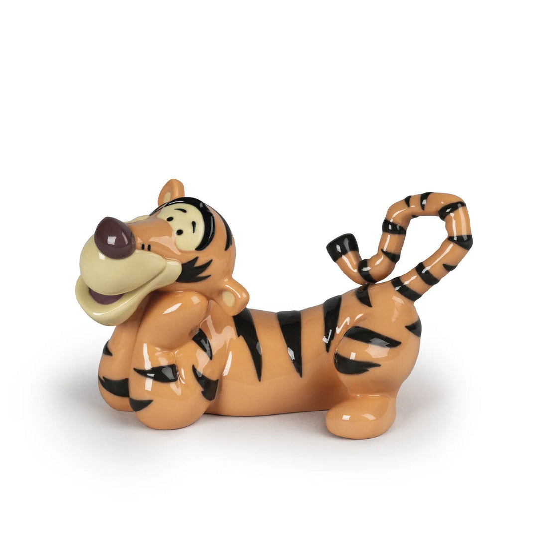 Hochwertige Porzellanfigur von Tigger mit fröhlichem Ausdruck und dynamischer Pose.