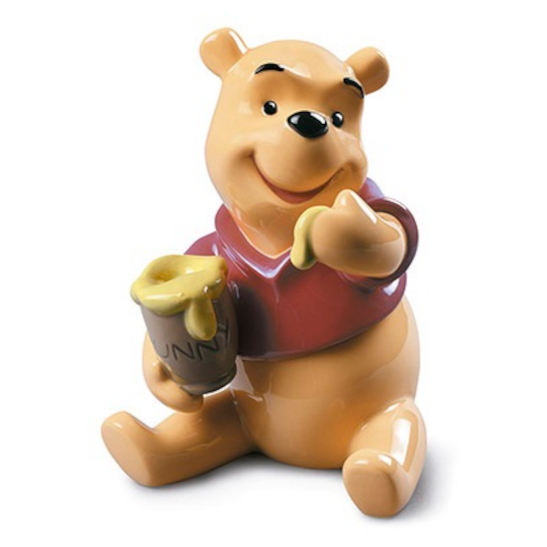 Hochwertige Porzellanfigur von Winnie the Pooh mit Honigtopf und fröhlichem Ausdruck.