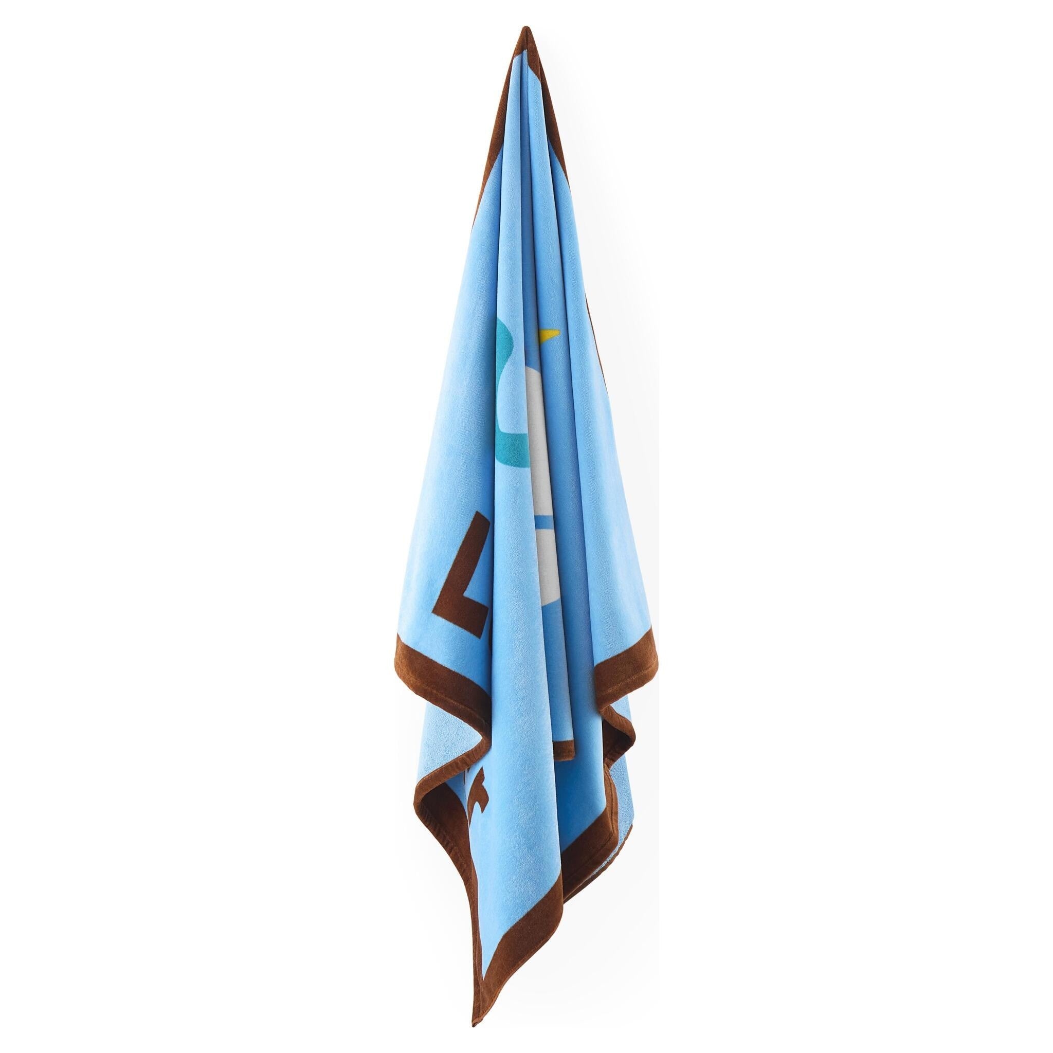 Blaues Strandtuch mit La-Mer-Motiv von Jonathan Adler