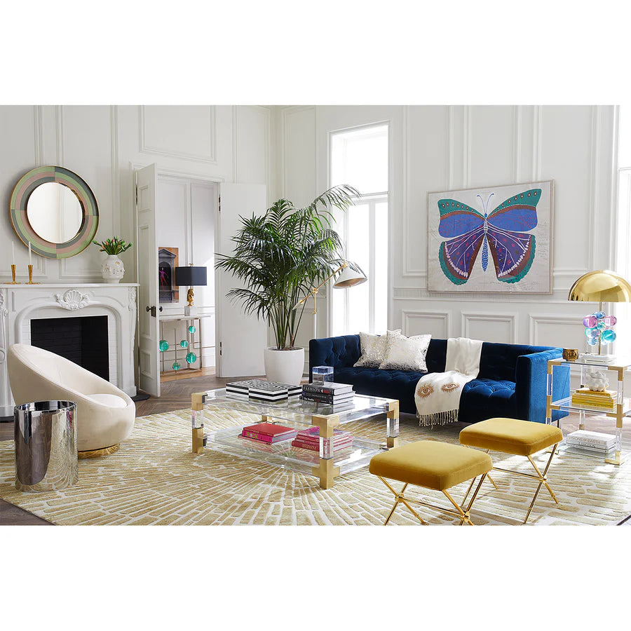 Rider X-Hocker im modernen Wohnambiente mit Goldakzenten