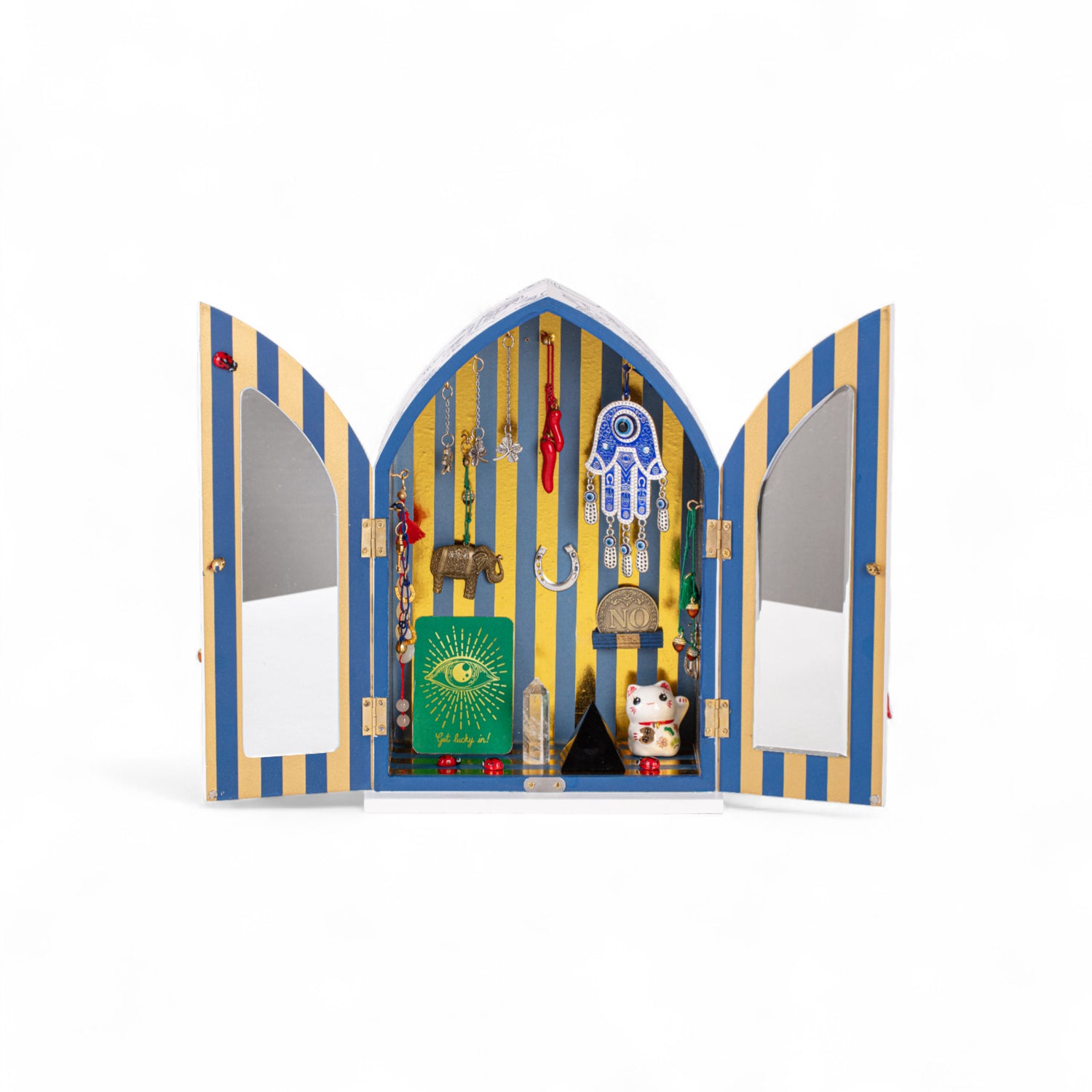 LUCKY TEMPLE von Seletti als buntes Dekoobjekt mit goldenen Streifen